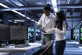 Team of engineers in data center looking for firewall misconfigurations