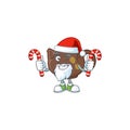 Teapot Cartoon character in Santa costume with candy Royalty Free Stock Photo