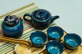 Teapot and cups of Chinese tea on the table for the tea ceremony. Oriental tea set. The concept of a traditional Asian tea Royalty Free Stock Photo