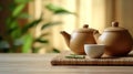 Teapot and cups on table with bamboo leaves. Generative Ai Royalty Free Stock Photo