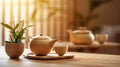 Teapot and cups on table with bamboo leaves. Generative Ai Royalty Free Stock Photo