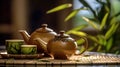 Teapot and cups on table with bamboo leaves. Generative Ai Royalty Free Stock Photo