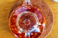 Teapot of freshly brewed fruit tea made from red fruit and honey. The view from the top Royalty Free Stock Photo