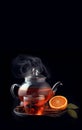 Teapot of freshly brewed orange tea. Generative AI.