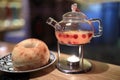 Teapot with ginger tea and bread Royalty Free Stock Photo