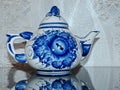 Teapot. Home tableware in Russian traditional Gzhel style. Closeup. Gzhel - Russian folk craft of ceramics