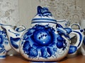 Teapot. Home tableware in Russian traditional Gzhel style. Closeup. Gzhel-Russian folk craft of ceramics and production porcelain