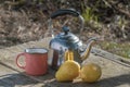 teapot with mug and pears on table Royalty Free Stock Photo