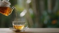 The teapot pouring steaming tea into a glass cup on a wooden table. AI generated image Royalty Free Stock Photo