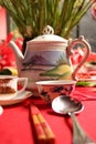 Teapot set in ceramic on a table setting. Royalty Free Stock Photo
