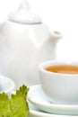 Teapot and white teacup Royalty Free Stock Photo