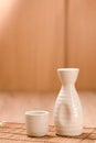 Teapots and glass on wood table