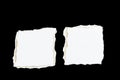 Tear white paper pieces of paper on black Royalty Free Stock Photo