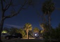 Teardrop camper in campsite at Hunting Island State park, South Carolina at night with stars