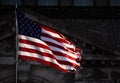 Teared apart USA flag and abandoned building Royalty Free Stock Photo