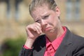 Tearful Adult Blonde Business Woman Wearing Suit