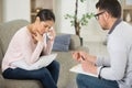 tearful woman talking to therapist