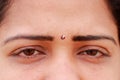 The tears of tears flow from the cute eyes of the South Indian lady model