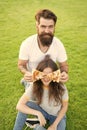 Teasing her with food. Fast food. Bearded man feeding woman cheesy pizza. Couple in love dating outdoors eat pizza Royalty Free Stock Photo