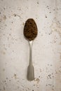 Teaspoon filled with dark brown sugar Royalty Free Stock Photo