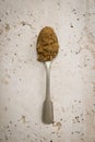 Teaspoon with light brown sugar Royalty Free Stock Photo