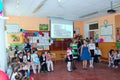 Teather with pupils in the classroom