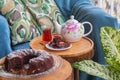 Teatime on a balcony with homemade cake Royalty Free Stock Photo