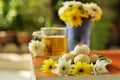 Teatime with Chinese pastry and tea and flower on a orange chair Royalty Free Stock Photo