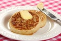 Teatime treat of crumpets and butter Royalty Free Stock Photo