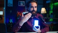 Tech guru filming technology review of mini led lights, offering feedback