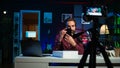 Tech guru using professional camera to film technology review of new cellphone