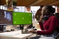 Tech startup IT expert using AI systems on mockup PC