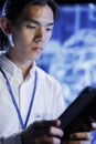 Tech support does AI systems checkup Royalty Free Stock Photo