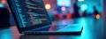 Laptop screen displays coding. Tech work in progress. Coding session at night. Data analytics. Digital world. Tech environment. Royalty Free Stock Photo
