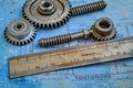Technical blueprint of mechanical engineering with gears and drafting tools Royalty Free Stock Photo