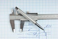 Technical drawing and callipers with pen Royalty Free Stock Photo