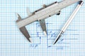 Technical drawing and callipers with pen