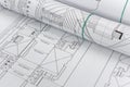 Technical drawings with blueprints in rolls close up. Engineering concept Royalty Free Stock Photo