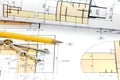 Technical project drawings, rolls of blueprints and drawing tool Royalty Free Stock Photo