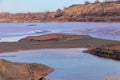 Technical settler of industrial water of mining industry in Kryvyi Rih, Ukraine. Red water polluted with iron ore waste Royalty Free Stock Photo