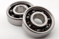 Technical solutions, engine engineering and machinery parts moving concept with metallic alloy deep groove mechanical ball bearing Royalty Free Stock Photo