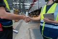 Technical staff and engineers shaking hands. Royalty Free Stock Photo