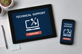 Technical support concept on tablet and smartphone screen Royalty Free Stock Photo