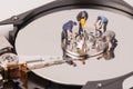 Technicial team miniature people repairing hard drive Royalty Free Stock Photo