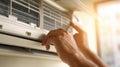 The technician adjusting the air conditioning unit for optimal performance. AI generated image Royalty Free Stock Photo