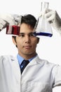 Technician with beaker and flask Royalty Free Stock Photo
