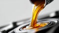 Pouring golden motor oil into engine parts for vehicle maintenance and lubrication to ensure smooth performance and durability Royalty Free Stock Photo
