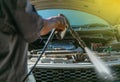 Technician checking air conditioner in engine room of eco car , cleaning air conditioner of car Royalty Free Stock Photo