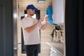 The technician checking the heating system in the boiler room with tablet in hand Royalty Free Stock Photo