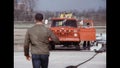 A technician checks the emergency stop cable of a military airport